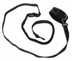 Black coiled safety leash with clips and ankle cuff for paddleboard use.