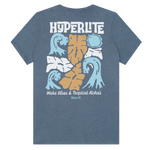 Back view of the Women's Tropics T with tropical floral and wave graphics and stylized text.