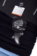 Surf Sock in black with motivational tag and drawstring closure.