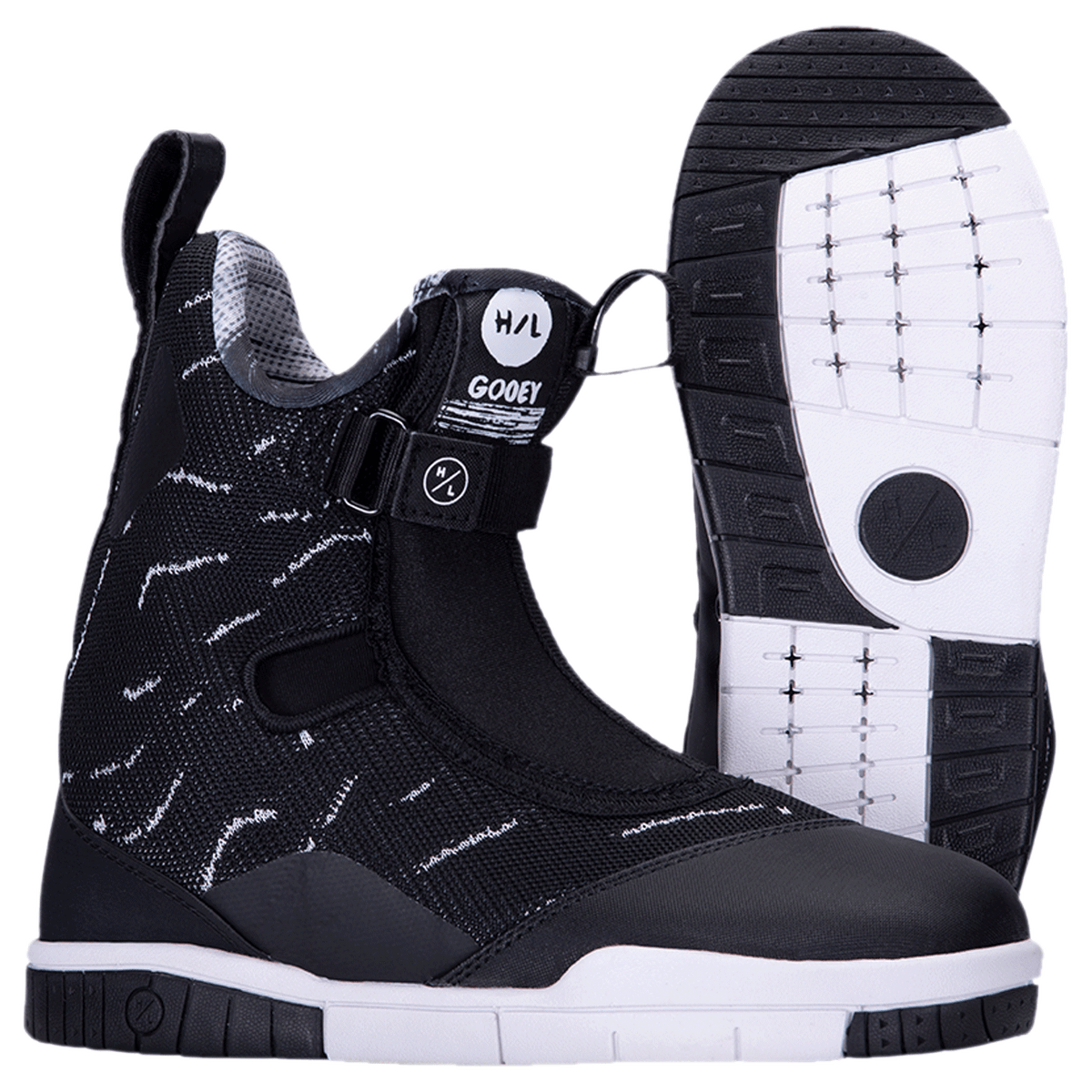Gooey Boot 2023: Black/white snowboard boots with lace system and textured soles.