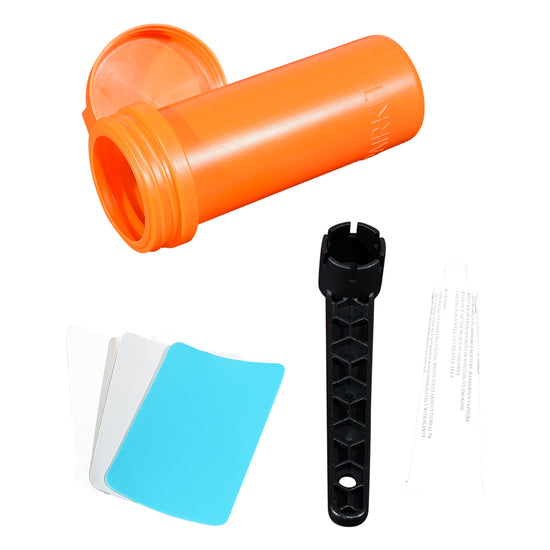Top view of the iSUP Repair & Patch Kit with open orange container, patches, tool, and adhesive.