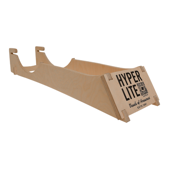 Wooden sled, Hyper Lite on side, displayed on a Foil Display Stand.