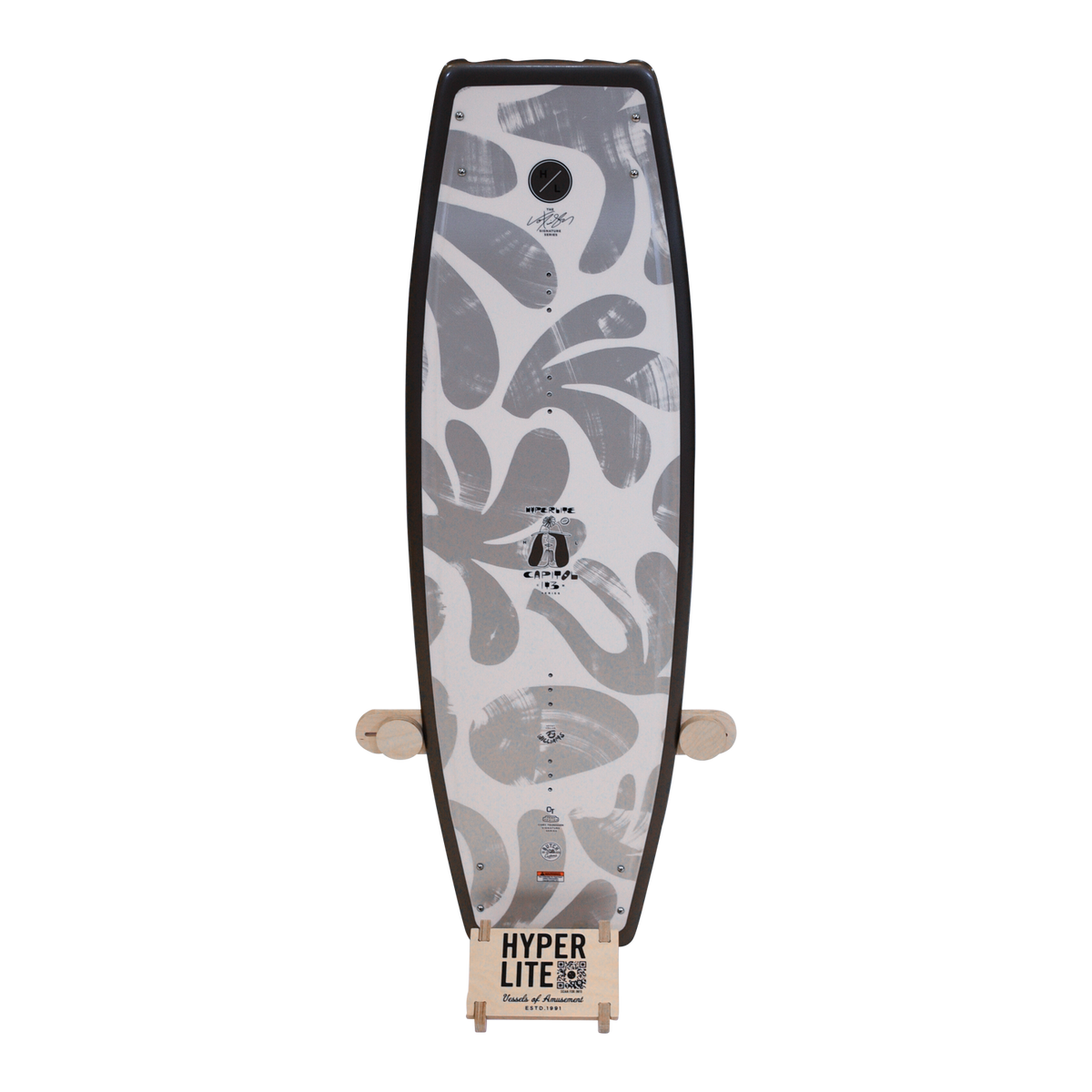 Wake& Surf Display Stand featuring black and gray abstract leaf design wakeboard.