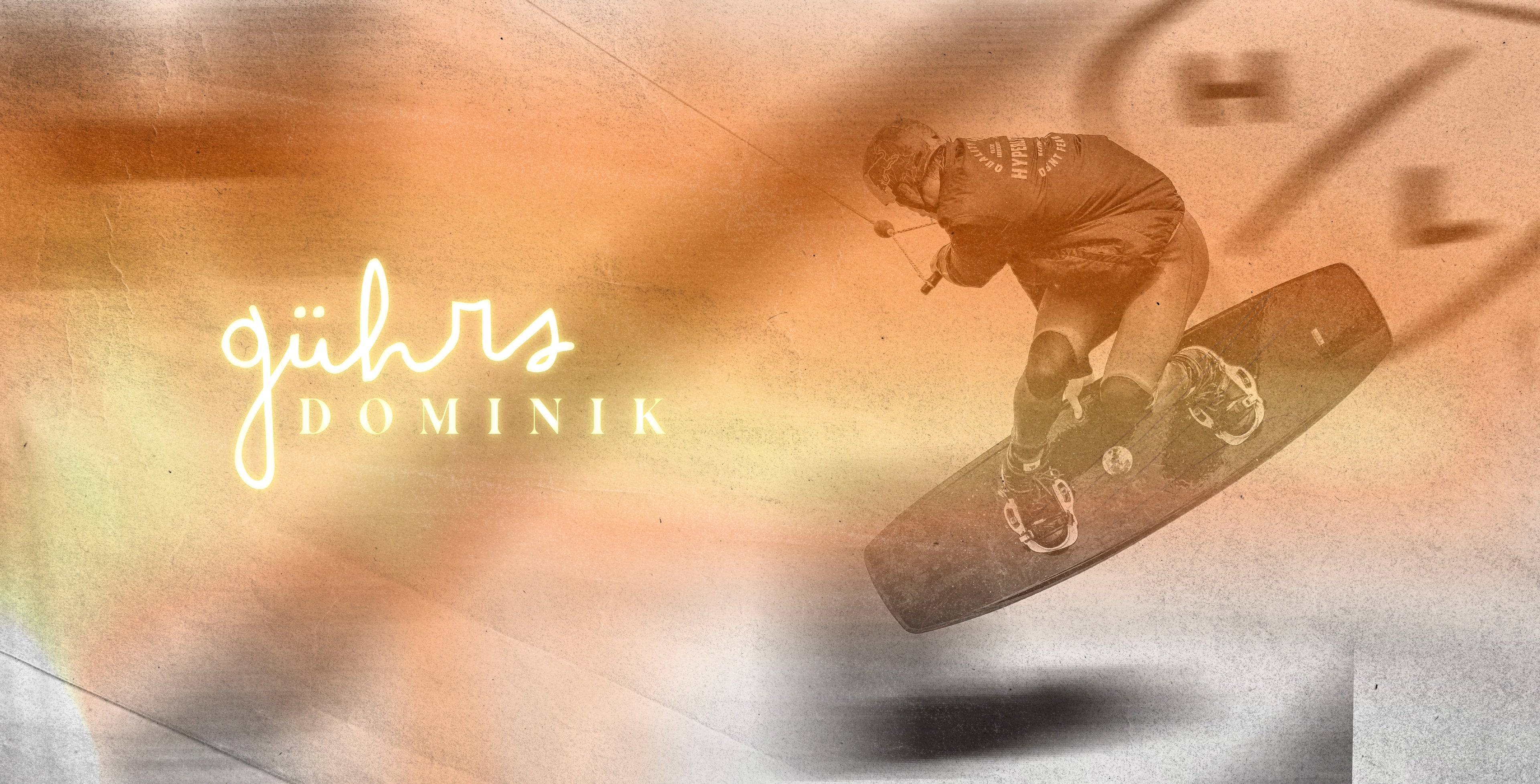 Wakeboarder in action with dynamic, blurred background; text says gührs Dominik.