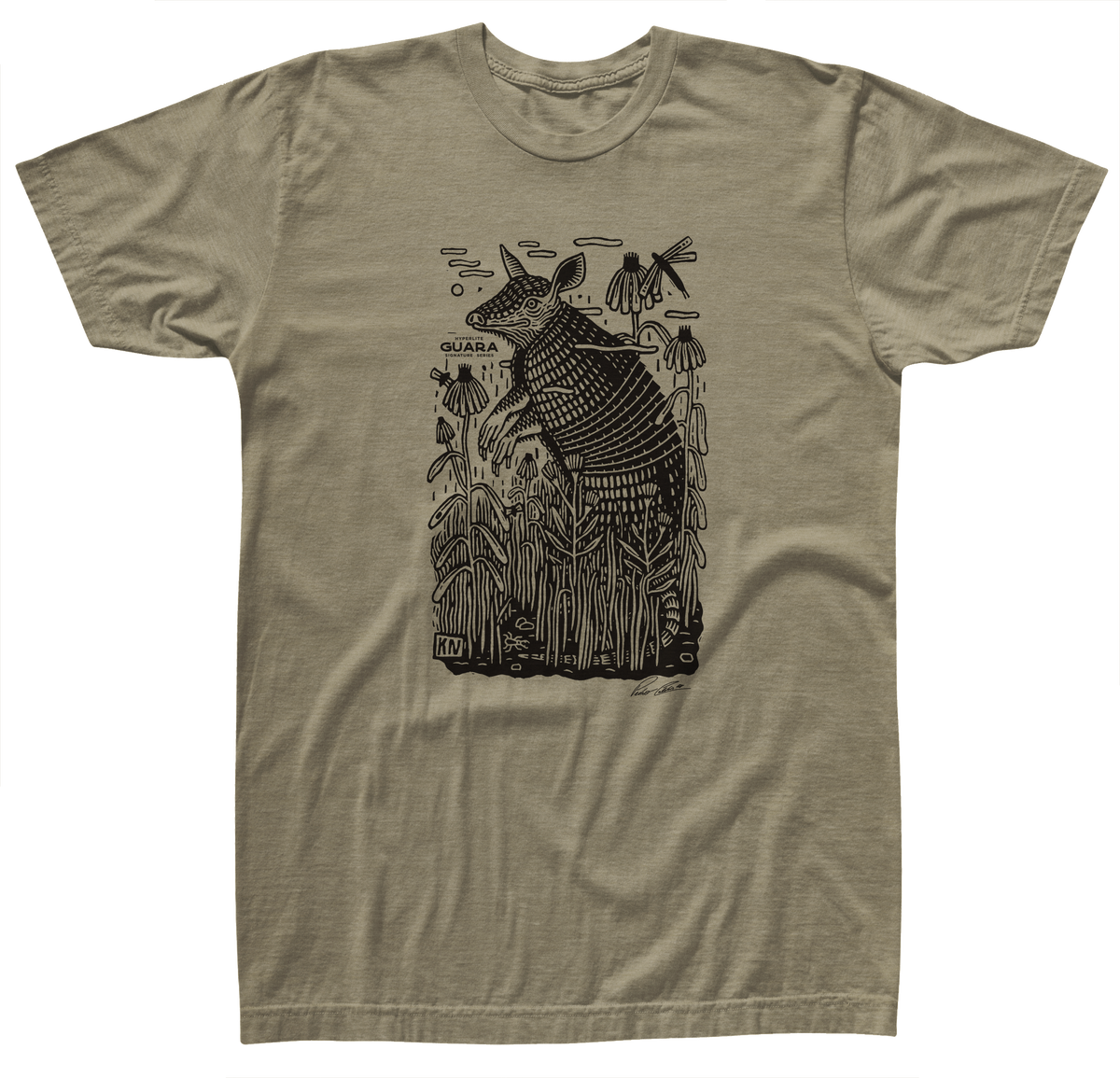 Guara Tee: Tan T-shirt with an armadillo design in a cotton/poly blend.
