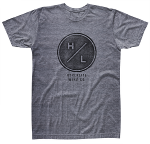 Gray HYERLITE WAKE CO. Outlier Tee Heather in Airlume cotton with a circular HL logo.