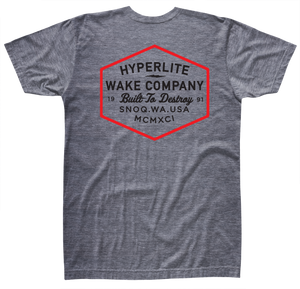 Shield Tee in gray Premium Triblend cotton with a red-outlined hexagonal logo and back text.