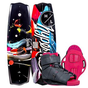 Eden 2.0 w/Viva Bindings: Colorful wakeboard with molded fins and gray boots in a vibrant setting.