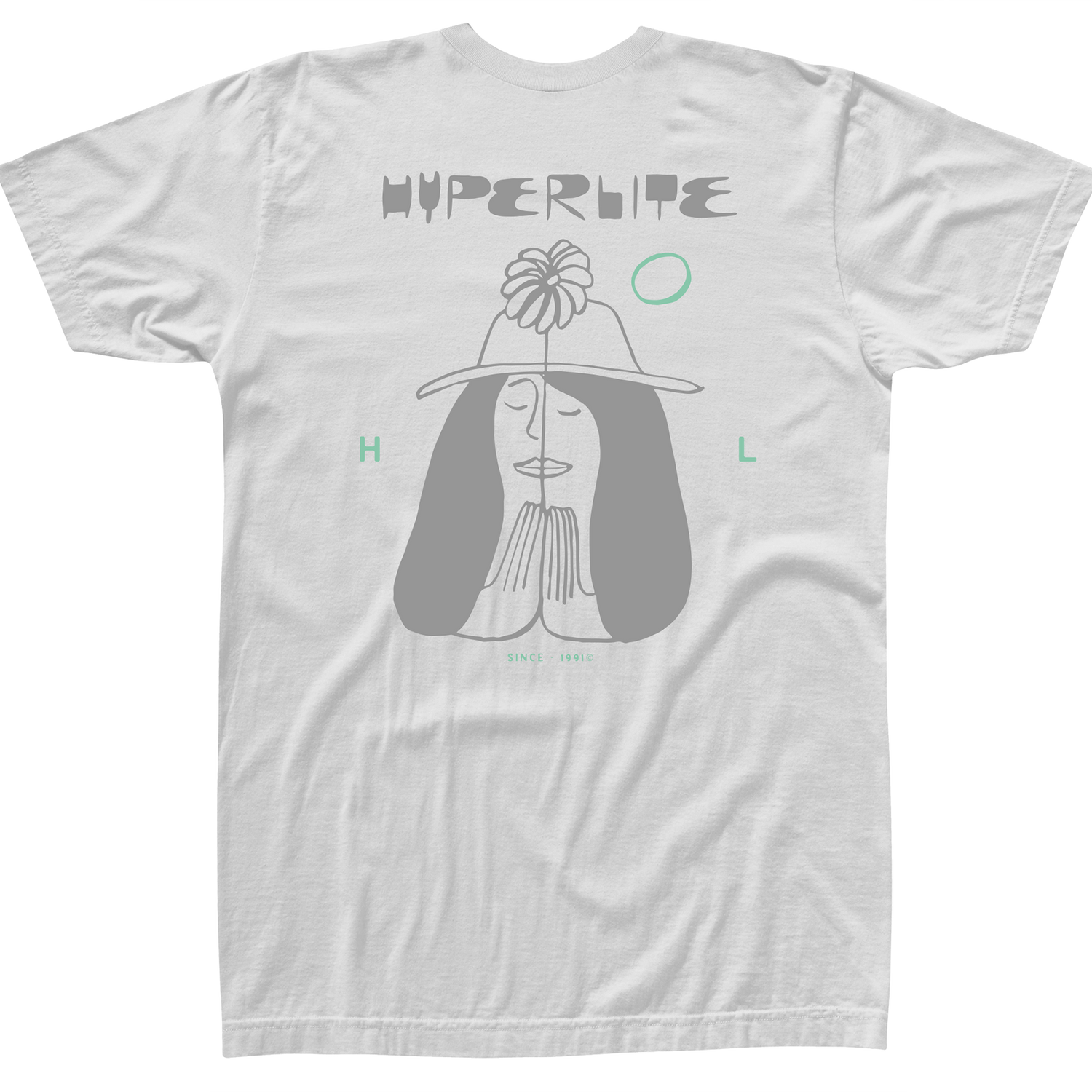 Back view of a white short-sleeve t-shirt with a large graphic of a peaceful woman wearing a hat and praying hands, ‘Hyperlite’ text above, and small mint green accents and text reading ‘Since 1991.