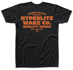Back view of black t-shirt with large orange logo that says Vessels of H20 amusement, HYPERLITE WAKE CO. , Quality goods don't fear time, USA.
