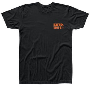 Front view of black t-shirt with orange logo saying ESTD. 1991 and a small circle H/L Logo on the left chest.