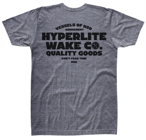 Front view of gray t-shirt with large black logo that says Vessels of H20 amusement, HYPERLITE WAKE CO. , Quality goods don't fear time, USA.
