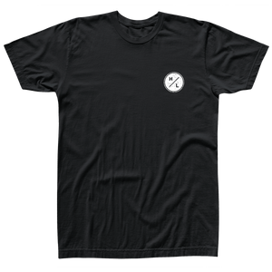 Front view of black t-shirt  with a small white HL logo on the front left chest.
