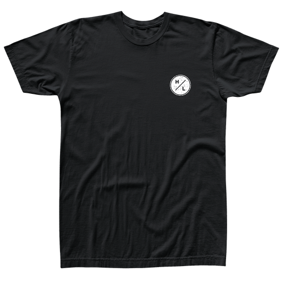 Front view of black t-shirt  with a small white HL logo on the front left chest.
