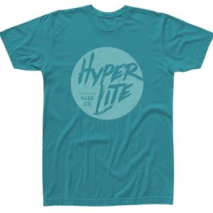 Front view of the Youth Fun Seeker T in turquoise with a large circular Hyperlite graphic.