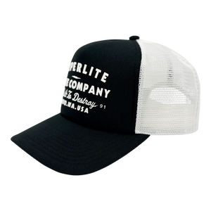 Angled view of the Harley Trucker Hat showing black front panel and white mesh back.