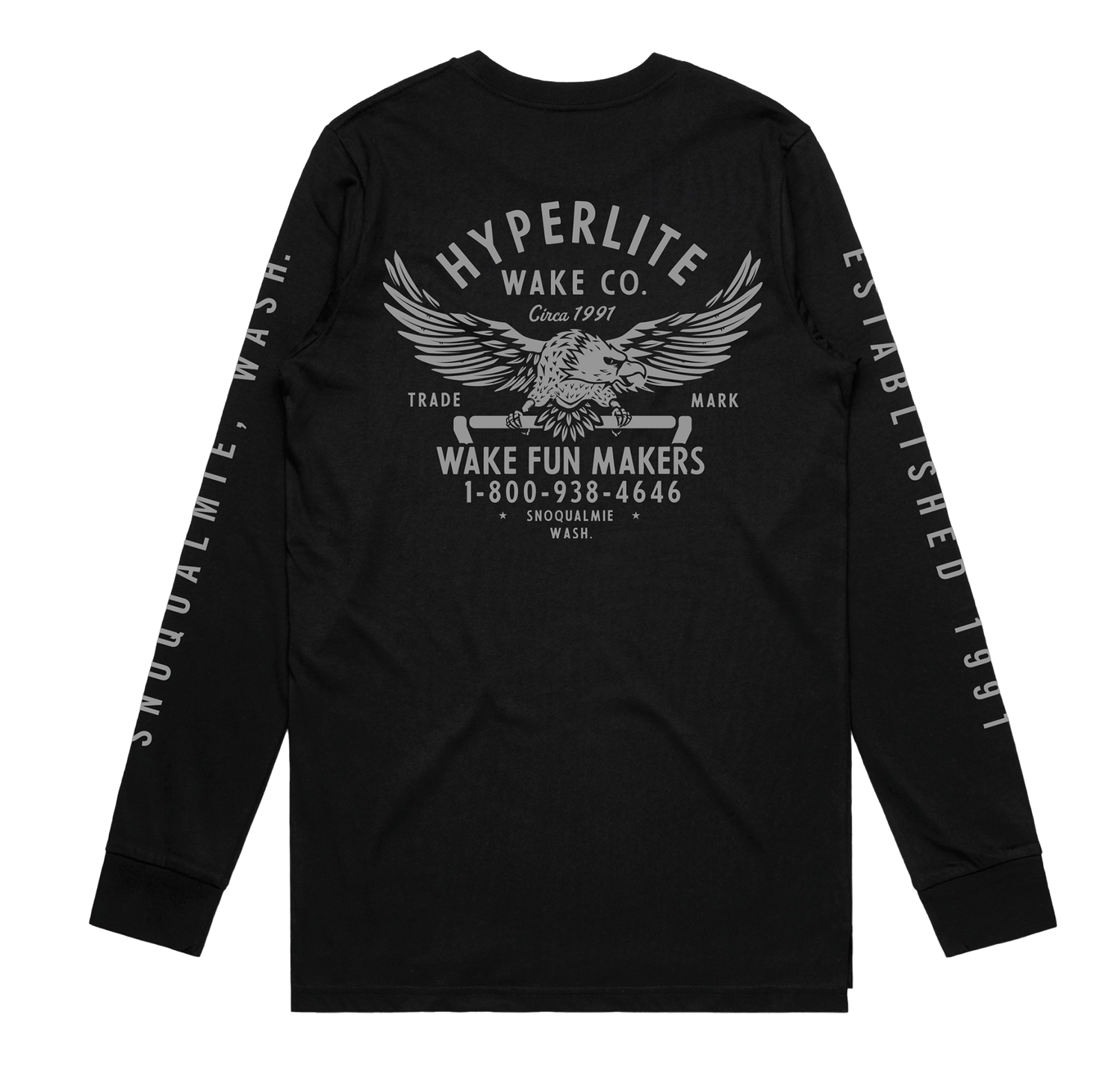 Back view of a black long-sleeve shirt featuring a large graphic of an eagle holding a wakeboard handle with text reading 'Hyperlite Wake Co. Wake Fun Makers, 1-800-938-4646, Snoqualmie, Wash.' Sleeves have 'Snoqualmie, Wash.' and 'Established 1991' printed in gray.