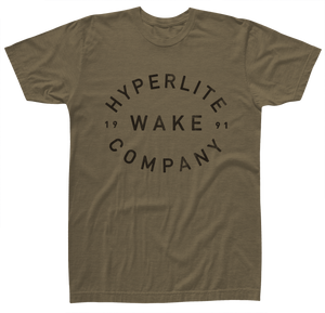 Back view of brown t-shirt with large black Hyperlite Wake Company 1991 logo in a circular design.