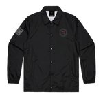 Front view of the black Riders Coach Jacket with chest patch and sleeve graphic.