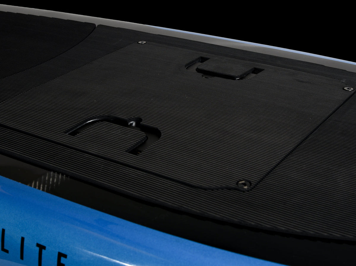 Close-up of Stratos Board 5.0 w/Foil showing black deck handles and textured surface.