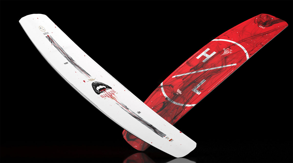 Angled side view of Bloodline wakeboard showing red base and white top with smoke design.