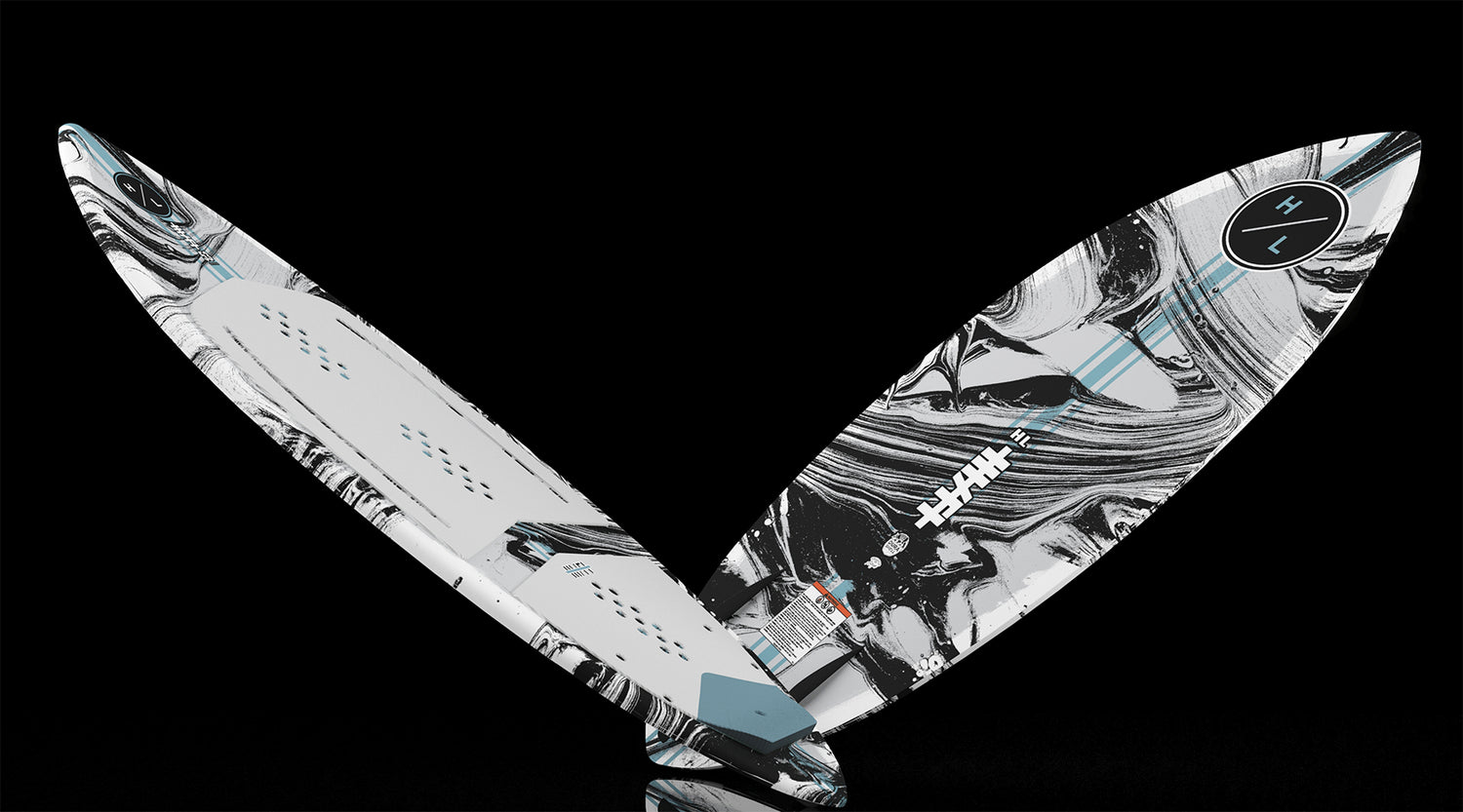 Angled view of Hi-Fi board showing white pad and marbled black and white base.