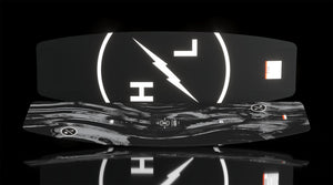 Angled view of Impulse wakeboard showing marbled top and bold HL lightning logo on base.