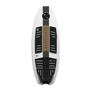 Top view of MOAB board with black and brown traction pads on white surface.