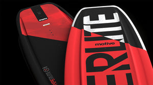 Detail of Motive Jr. wakeboard with red and black panels and large logo on base.