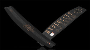 Angled views showing Rage Loaded wakeboard top and base with copper accents.