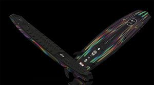 Angled view of Time Machine board showing black deck, pad and multicolor abstract base.