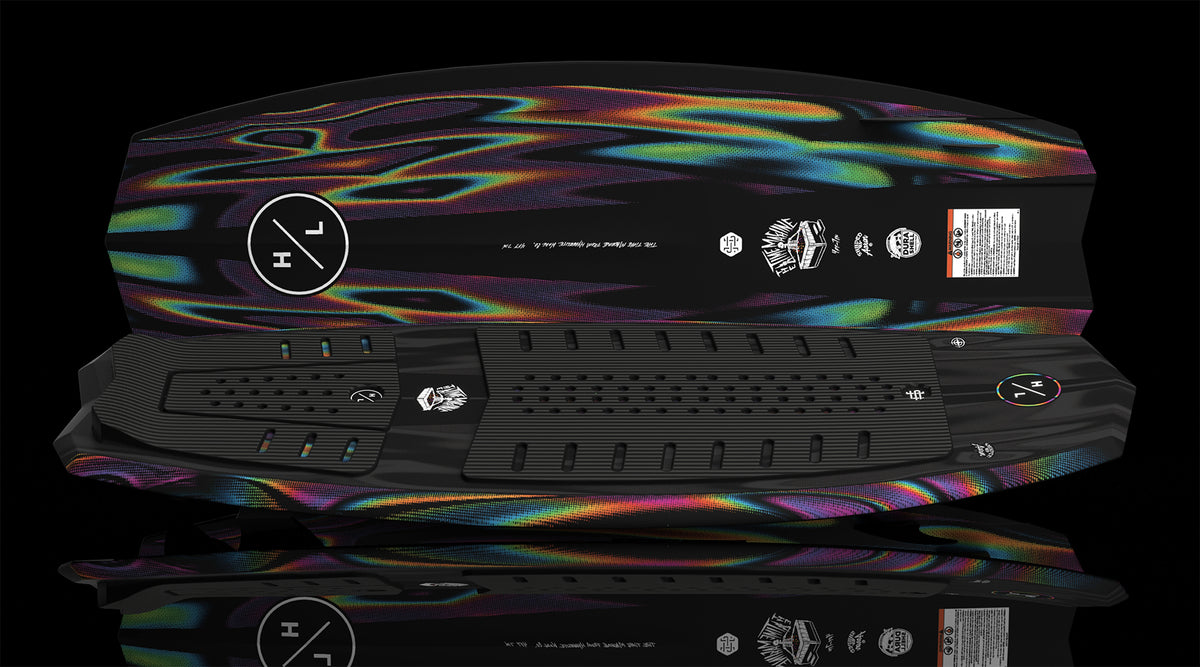 Angled view of Time Machine board showing ribbed deck and multicolor abstract underside.