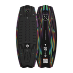 Top and base view of Time Machine board showing black deck with traction pad and abstract underside.