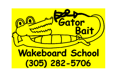 Yellow sign with a cartoon alligator for Gator Bait Wakeboard School.