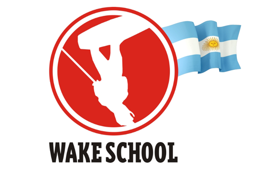 Silhouette of a wakeboarder with a waving Argentine flag.