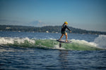 Foilsurfing on a lake with mountains using the Majik Karpet w/Raptor Carbon Foil Kit.