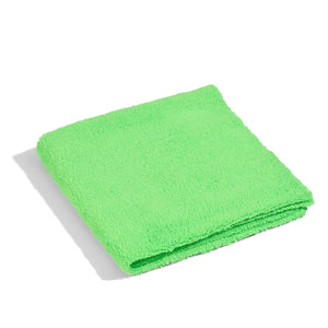 Folded green towel.