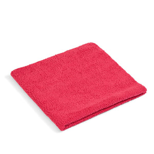 Red microfiber cleaning towel neatly folded.