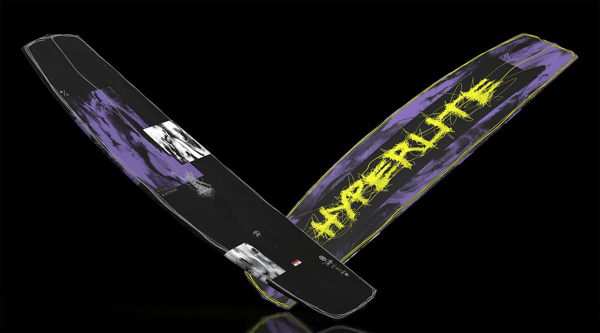 Angled view of black and purple Blueprint wakeboard showing both sides.