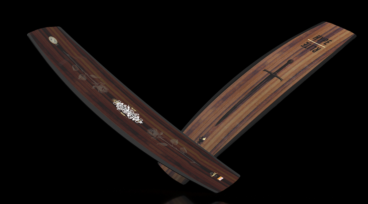 Angled view of two crossed Forge wakeboards with a dark wood-grain rose top and sword base.
