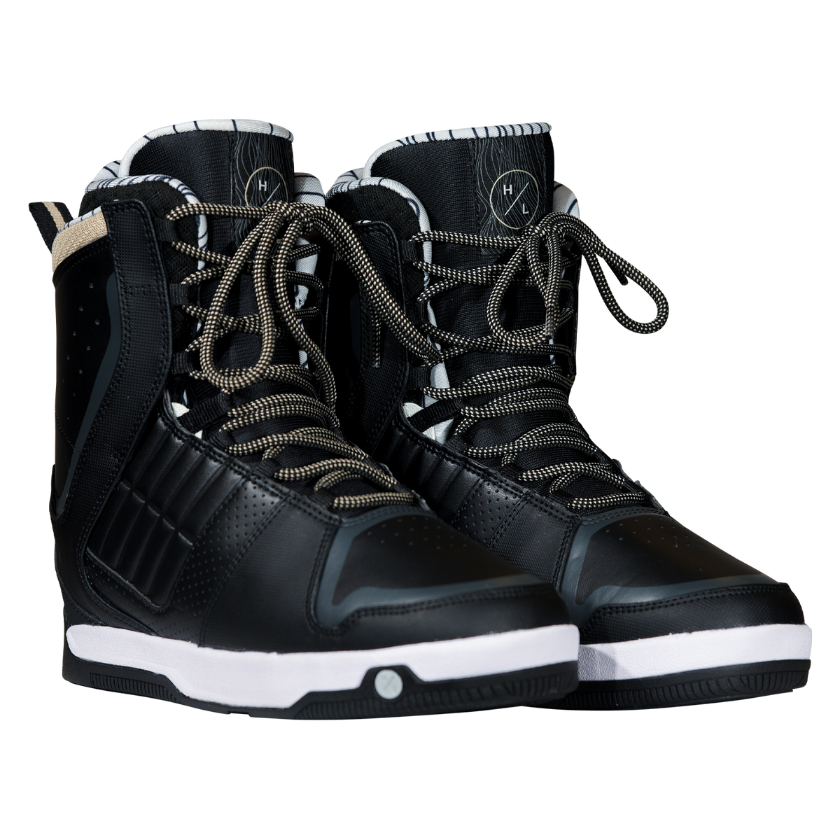 Angled view of a pair of black Freepress Boots with tan-flecked laces, ribbed panels, and striped liners.