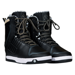 Angled view of a pair of black Freepress Boots with tan-flecked laces, ribbed panels, and striped liners.