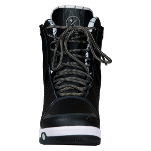 Front view of the black Freepress Boot with tan-flecked laces, a gray-trimmed toe, and a striped liner.