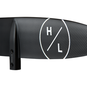 Close-up of a white Hyperlite logo on the Raptor 900 Front Wing's woven black finish by the drilled mount.
