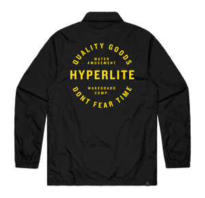 Factory Coach Jacket: black nylon with yellow Hyperlite patches, Quality Goods & Dont Fear Time.