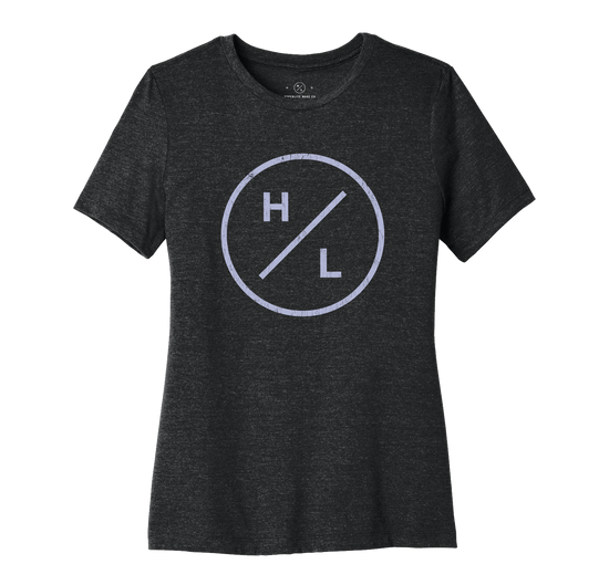 Wolfpack Tee: Black soft blend ladies T-shirt with a circular H/L logo on the front.