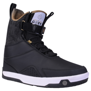 Gooey Boot: High-top black/white shoe with laces and strap.