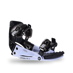 Side view of the black and white System Pro Binding with chrome buckles, a highback, and a ridged toe pad.
