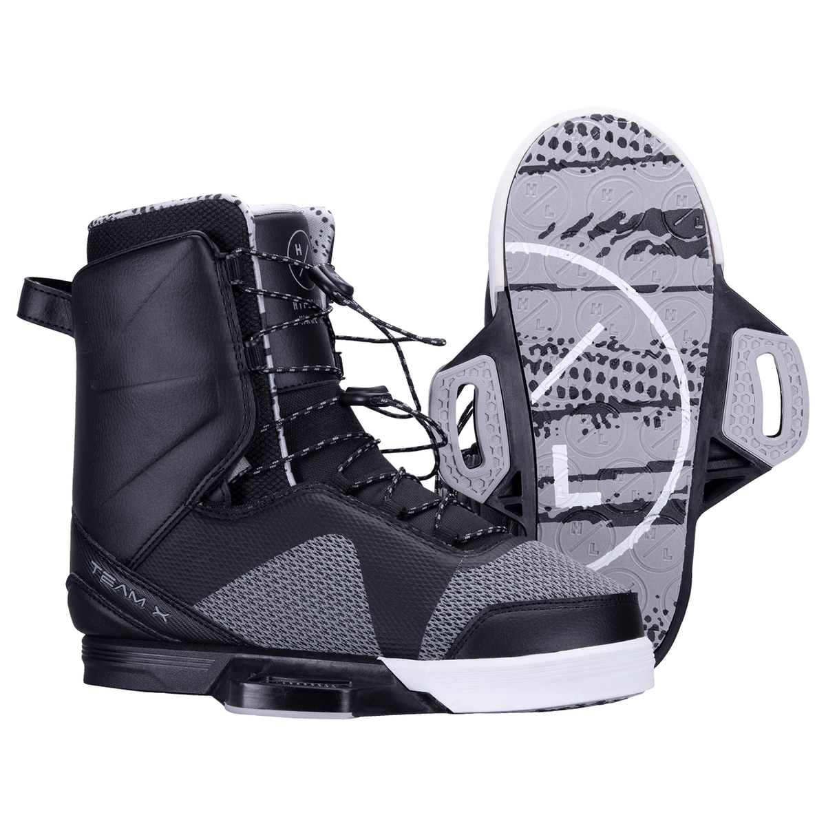 Black and gray snowboard boots, white soles, patterns, including Team X Binding.