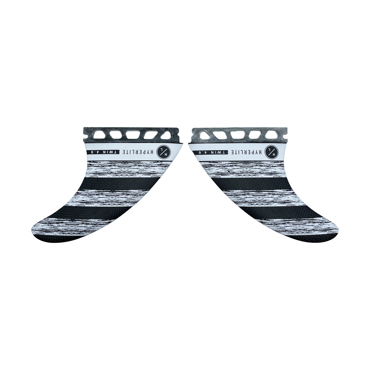 4.6 Carbon Twin Fin Pair with textured bases and carbon construction facing each other.